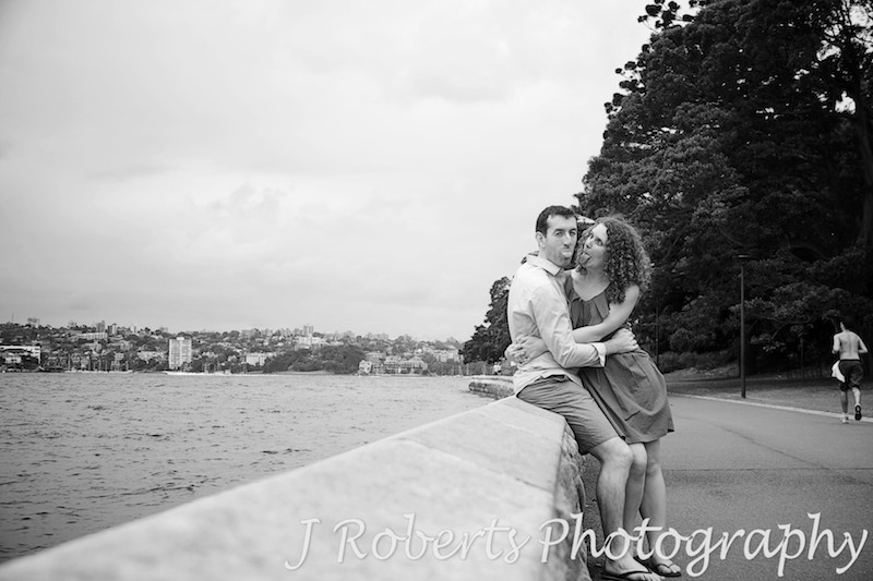Couple sticking tongues out in fun - engagement photography sydney